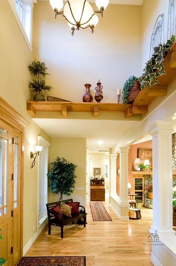 20 Cozy Apartment Entryway Ideas Worth Pinning 18 A Ledge Shelf for Display and Storage