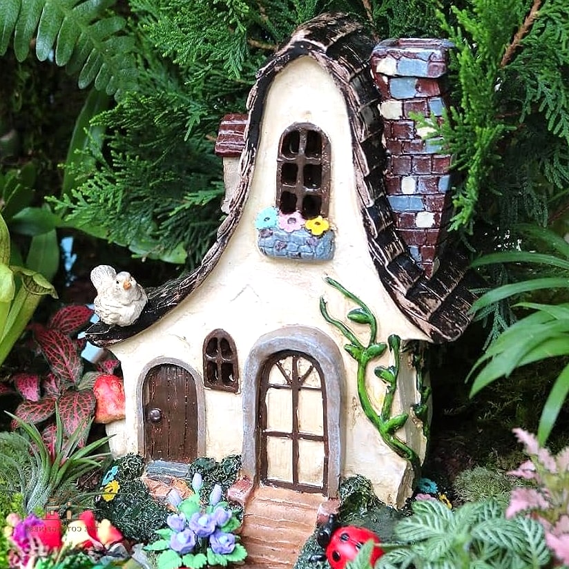 40 Cozy Large Fairy Garden Ideas Worth Pinning 3 A Miniature Cottage With a Mossy Roof