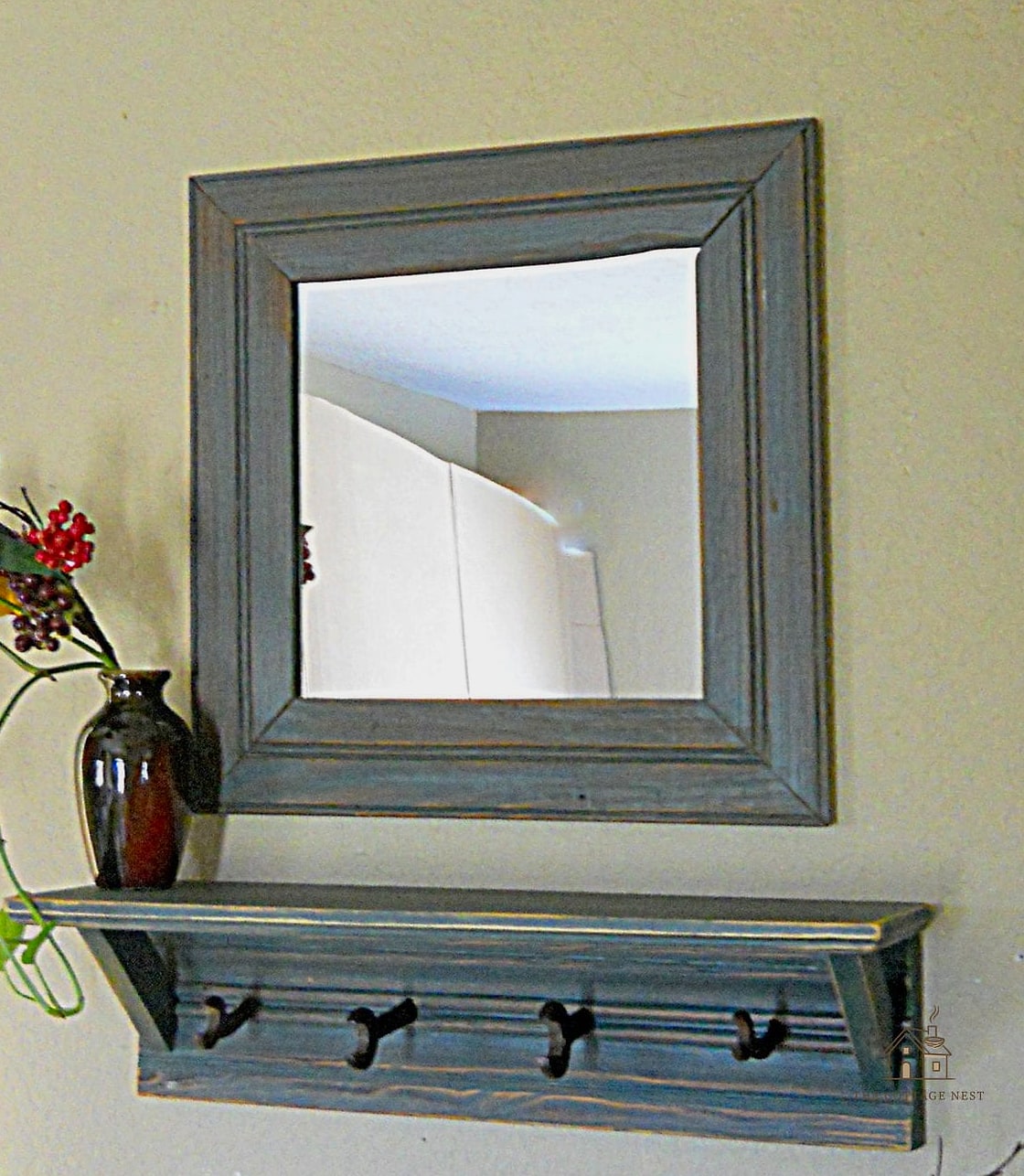 45 Creative Entryway Mirror Ideas That Will Inspire You 27 Mirror Combined with Hooks for Coats