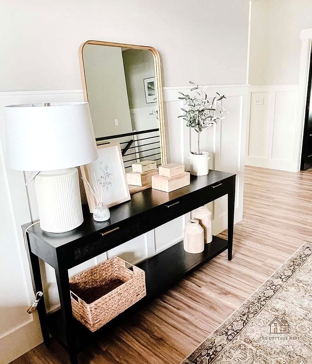 25 Chic Entryway Table Decor Ideas for a Beautiful Home 9 A Mirror Leaned Above the Table