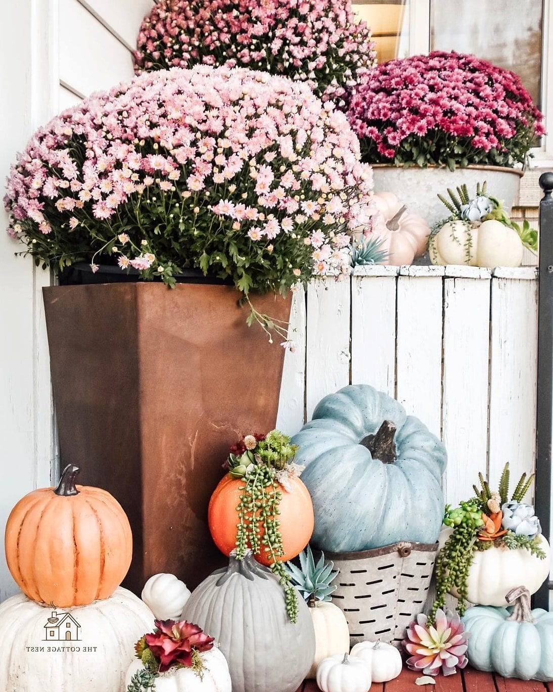 45 Gorgeous Fall Front Porch Decor Ideas That Are Totally Doable 6 Mums in Coordinating Planters