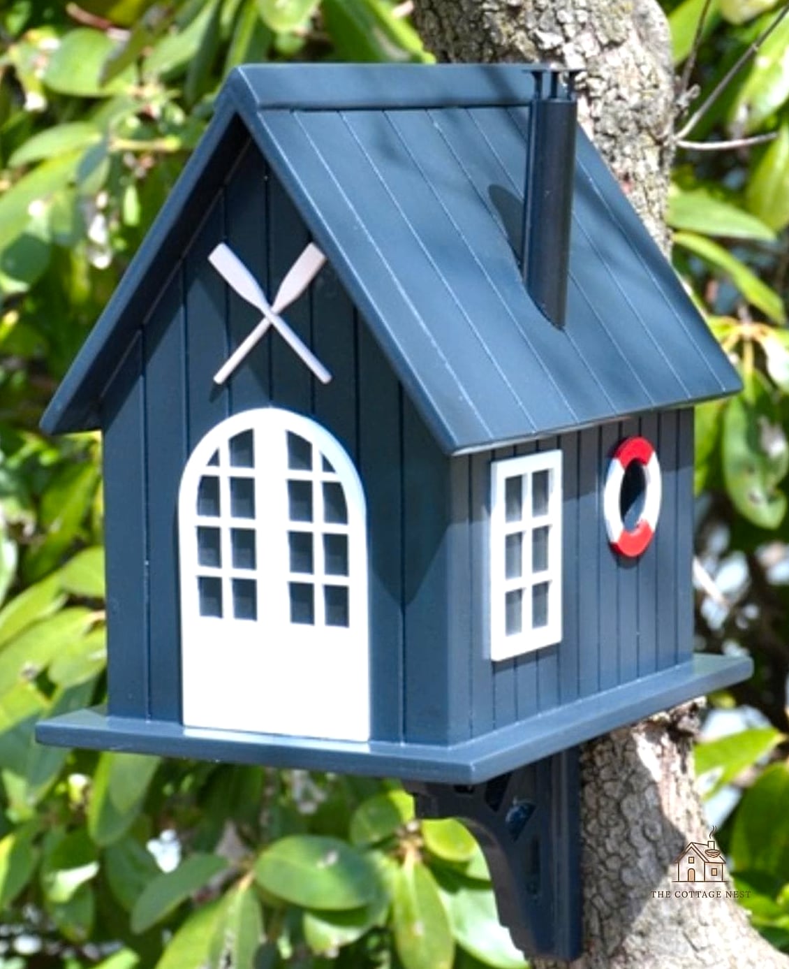 15 Chic Bird House Painting Ideas for a Beautiful Home 9 Navy with Brass Hardware Accents