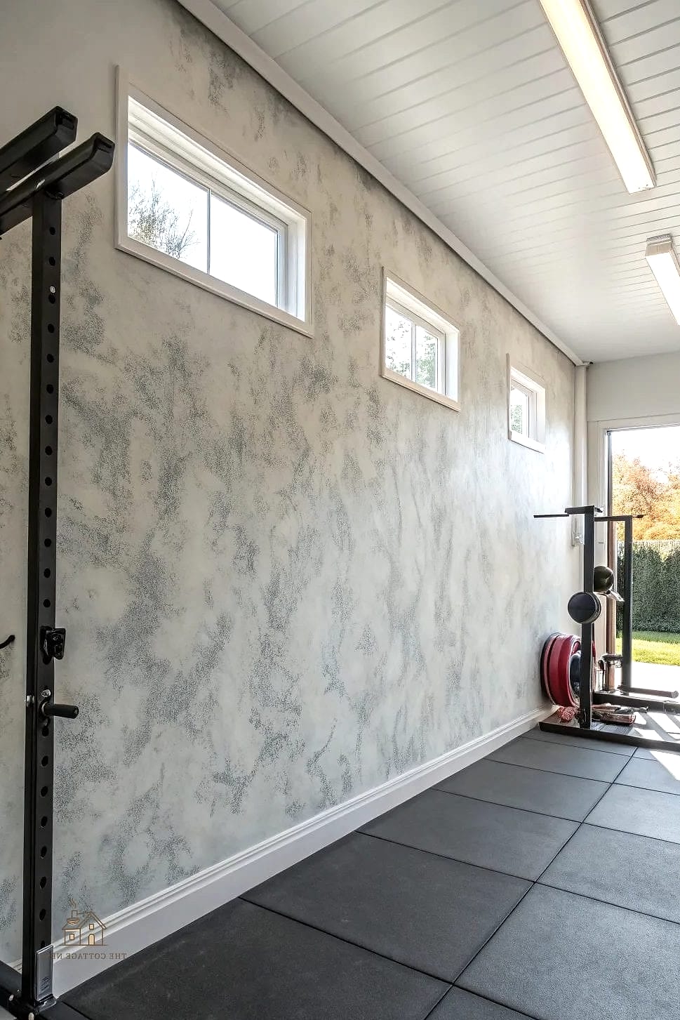 50 Beautiful Garage Gym Ideas to Transform Your Space 12 Neutral Concrete Floor with Epoxy Coating