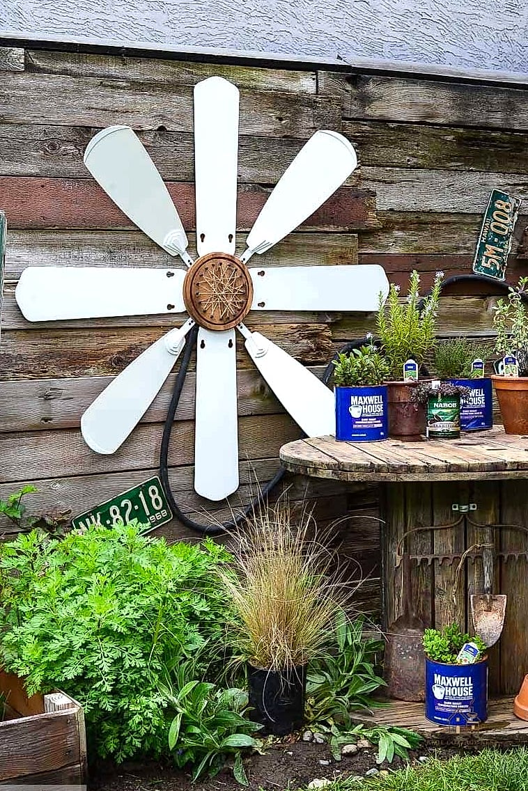 50 Clever Junk Garden Ideas Repurposed for Every Style 36 Old Ceiling Fan Blade Bird Feeder