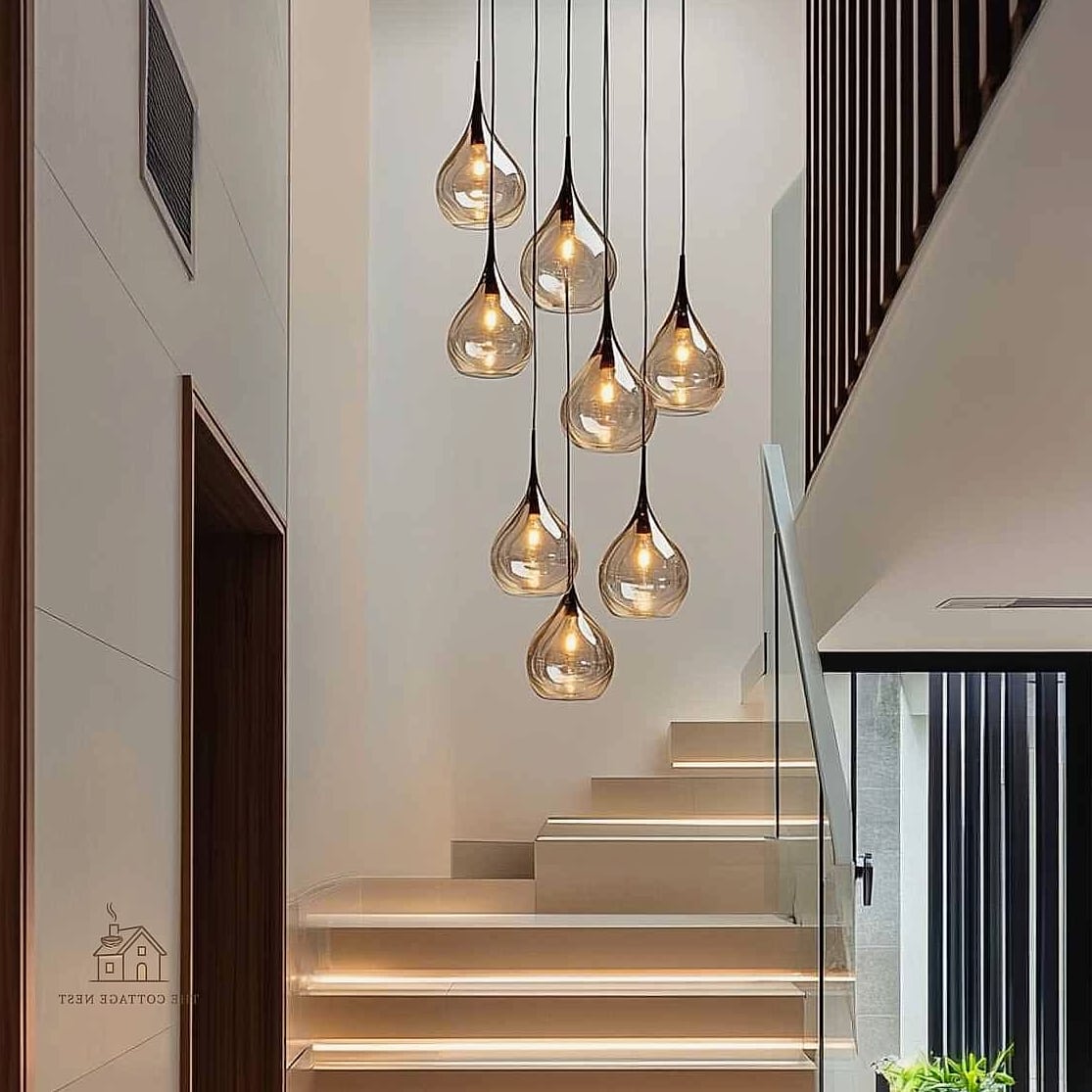 50 Clever Staircase Lighting Ideas for Every Style 38 Pendant Lights with Adjustable Cords