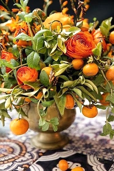 35 Beautiful Fall Table Centerpiece Ideas to Wow Your Guests 20 Persimmon and Citrus Bowl Centerpiece