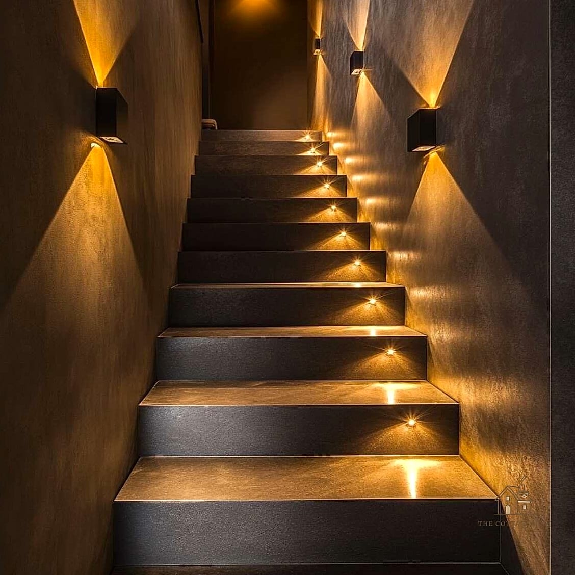 50 Clever Staircase Lighting Ideas for Every Style 16 Picture Lights Along a Gallery Wall Staircase