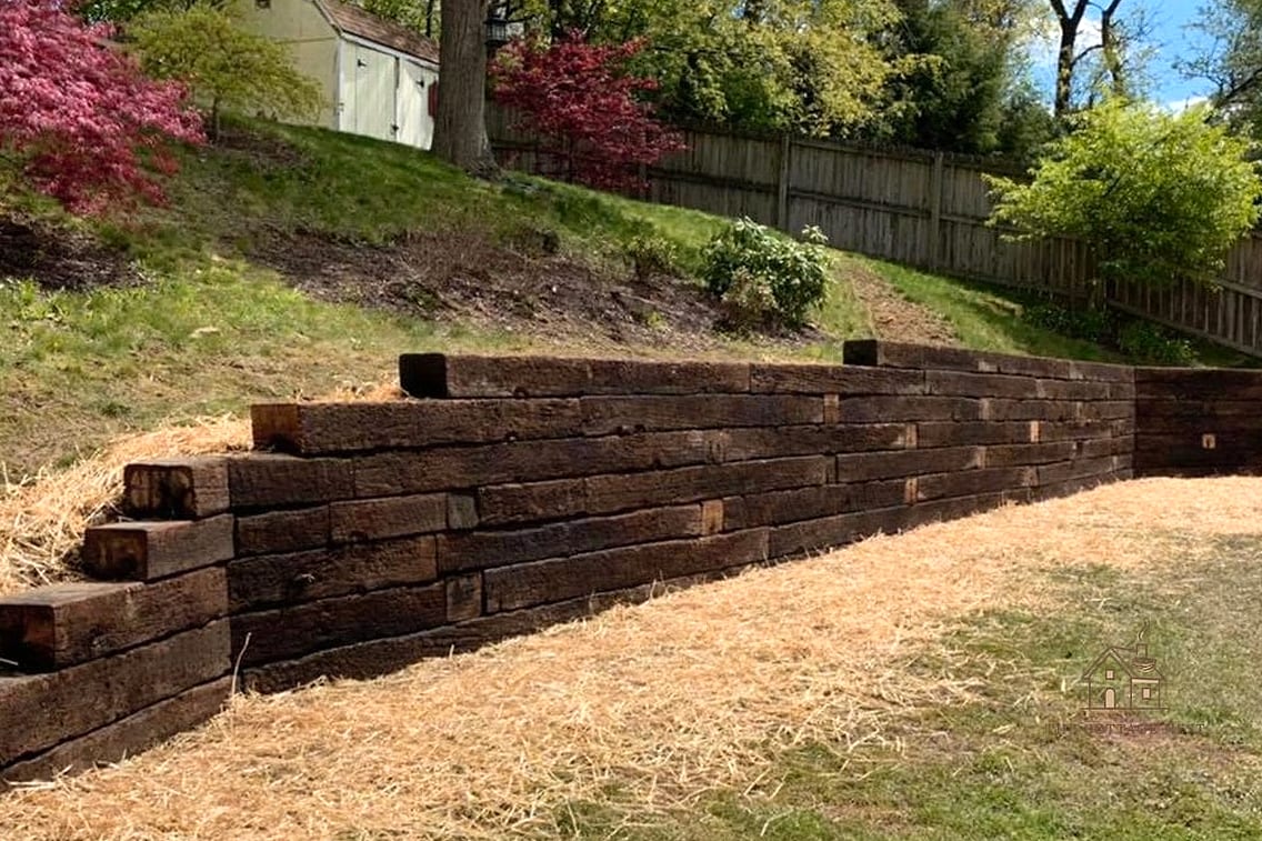 30 Beautiful Retaining Wall Ideas to Transform Your Space 16 Railroad Tie Walls