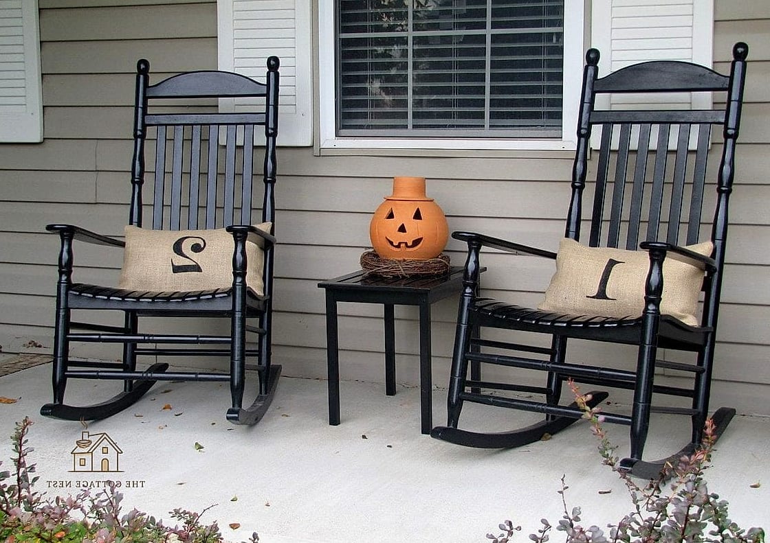 40 Clever Fall Front Porch Decor Ideas for Every Style 9 A Rocking Chair with Plaid Throws