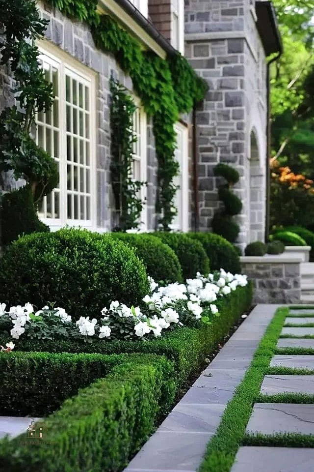 45 Stunning Corner Flower Bed Ideas You'll Absolutely Love 4 Rounded Boxwood Corner Hedge