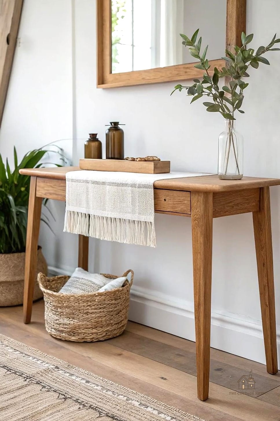 25 Chic Entryway Table Decor Ideas for a Beautiful Home 15 A Runner or Small Rug Underneath