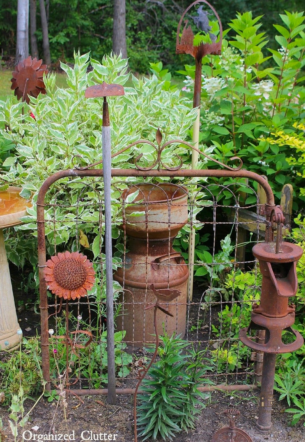 50 Clever Junk Garden Ideas Repurposed for Every Style 46 Rusty Farm Equipment Garden Art