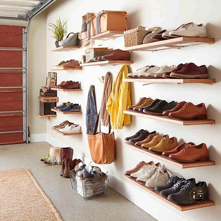 30 Cozy Garage Shoe Storage Ideas Worth Pinning 28 A Shoe Storage Wall with Chalkboard Backing