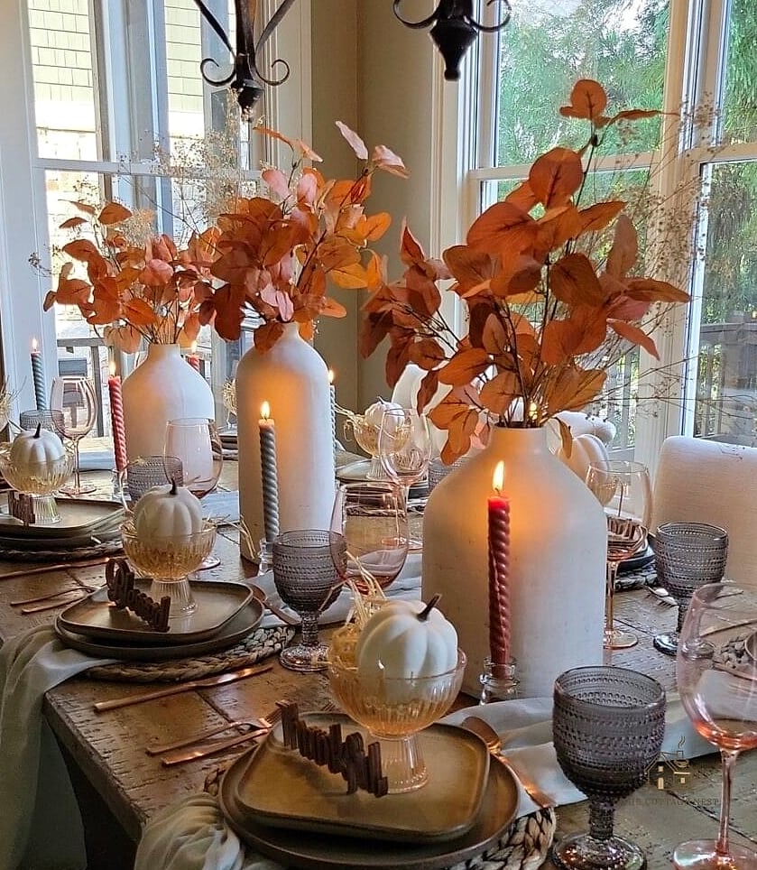 35 Beautiful Fall Table Centerpiece Ideas to Wow Your Guests 21 Smoked Glass Vase with Single Stem Blooms