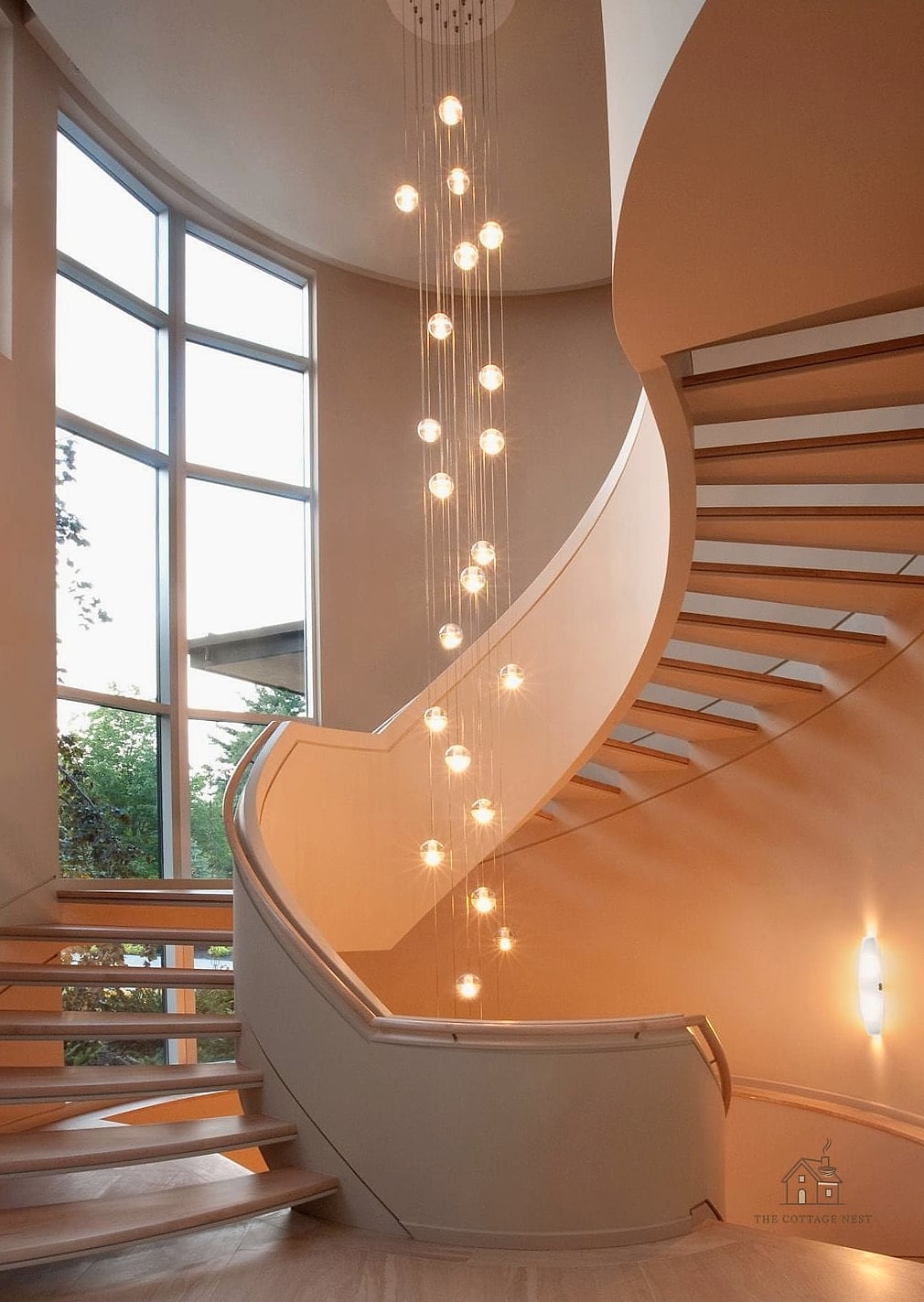 50 Clever Staircase Lighting Ideas for Every Style 18 Spiral Staircase Center Pole Lighting