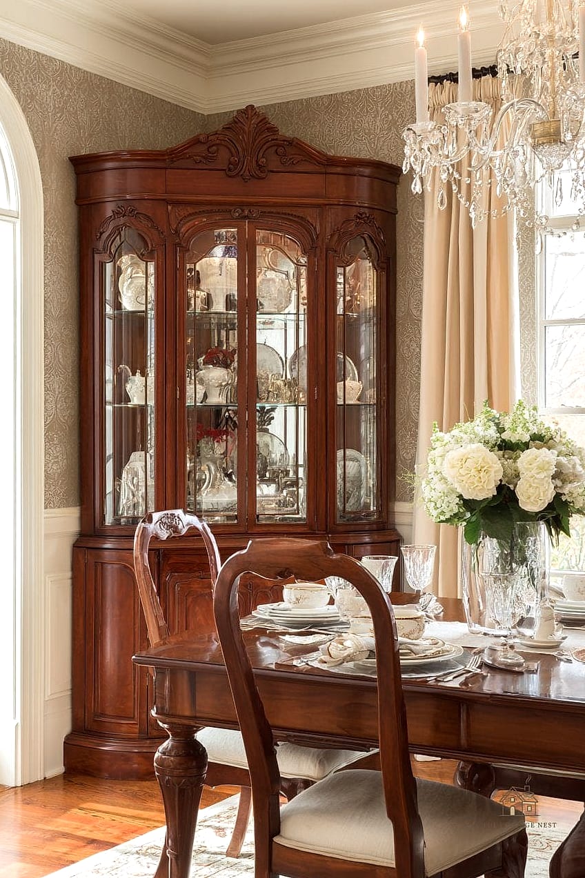 45 Brilliant Dining Room Table Centerpiece Ideas to Copy Right Now 43 A Stack of Cutting Boards with Styled Decor