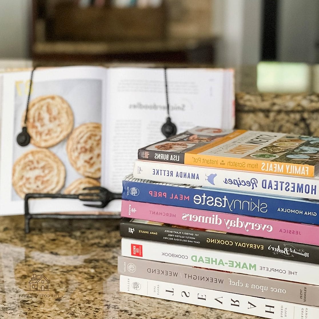 15 Brilliant Fall Kitchen Decor to Copy Right Now 14 Stacked Cookbooks as a Styling Base