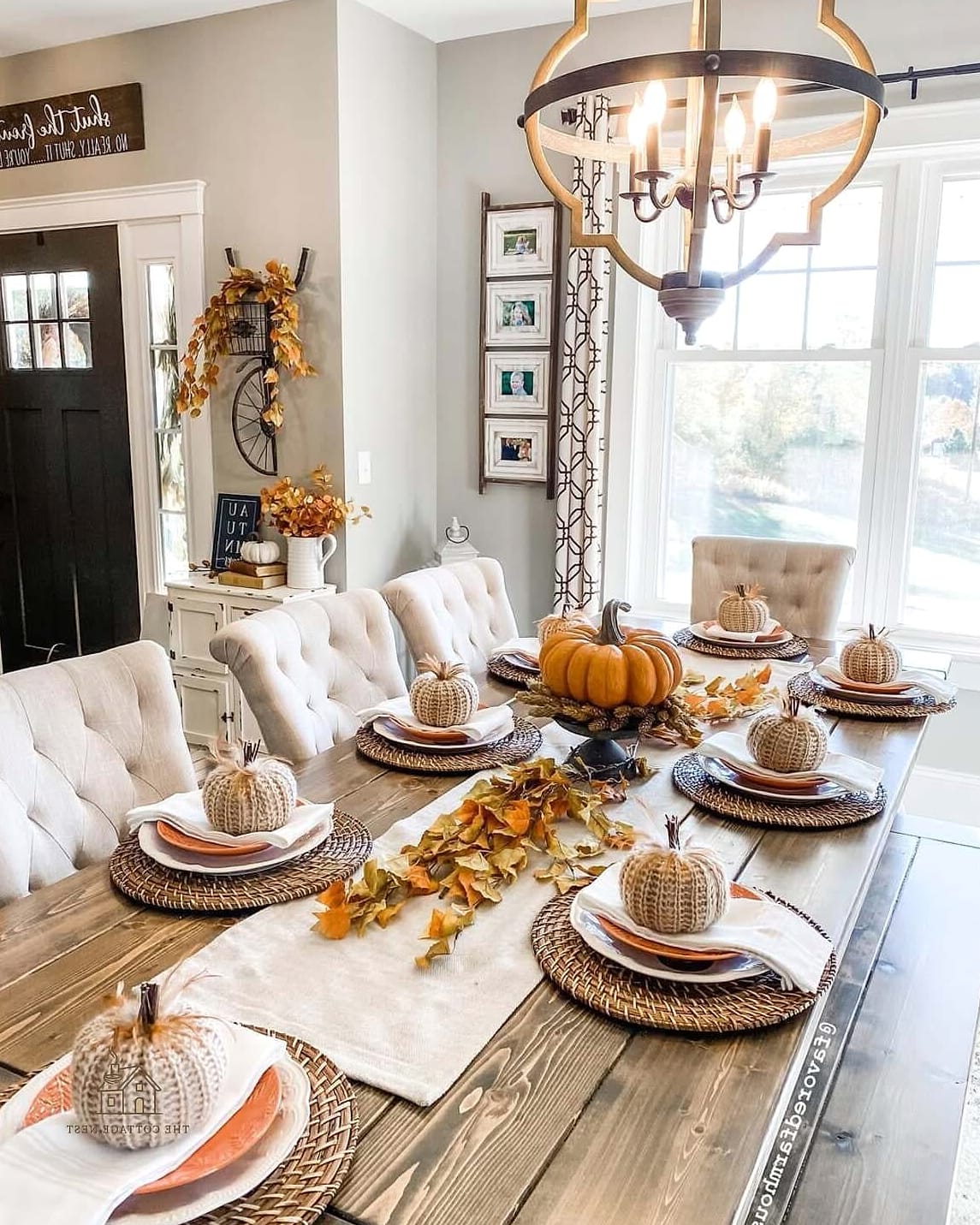 15 Creative Fall Dining Table Decor Ideas That Will Inspire You 9 Stacked Neutral Dinnerware With a Pop of Pattern