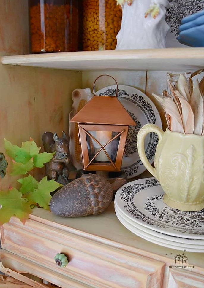 30 Dreamy Fall Hutch Decor Ideas to Try This Season 10 Stack of Vintage Books