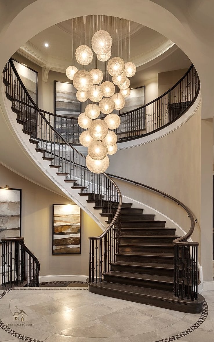 50 Clever Staircase Lighting Ideas for Every Style 10 Statement Chandelier for a Grand Staircase