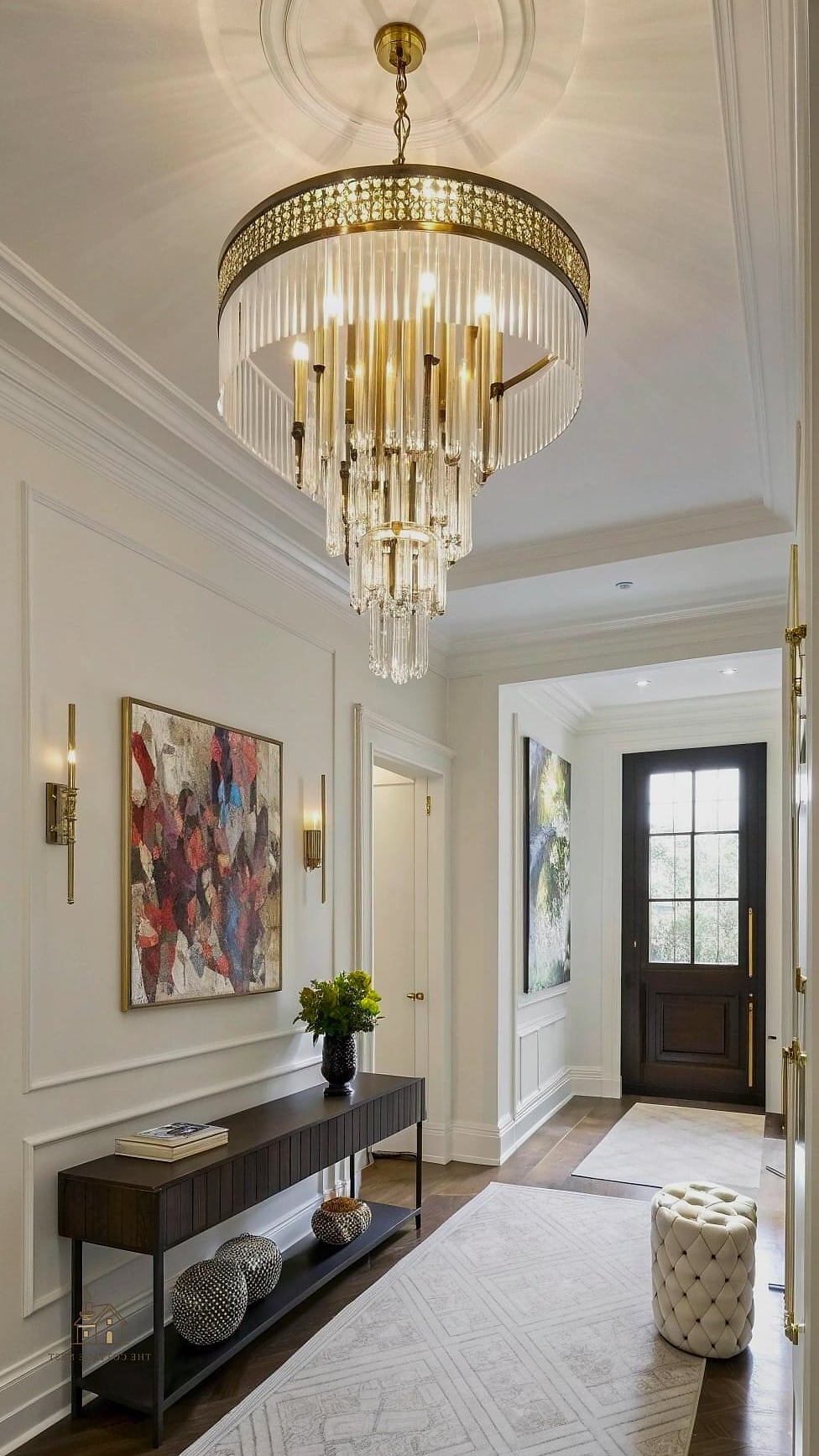 45 Stunning Small Entryway Ideas You'll Absolutely Love 26 A Statement Light Fixture as the Focal Point