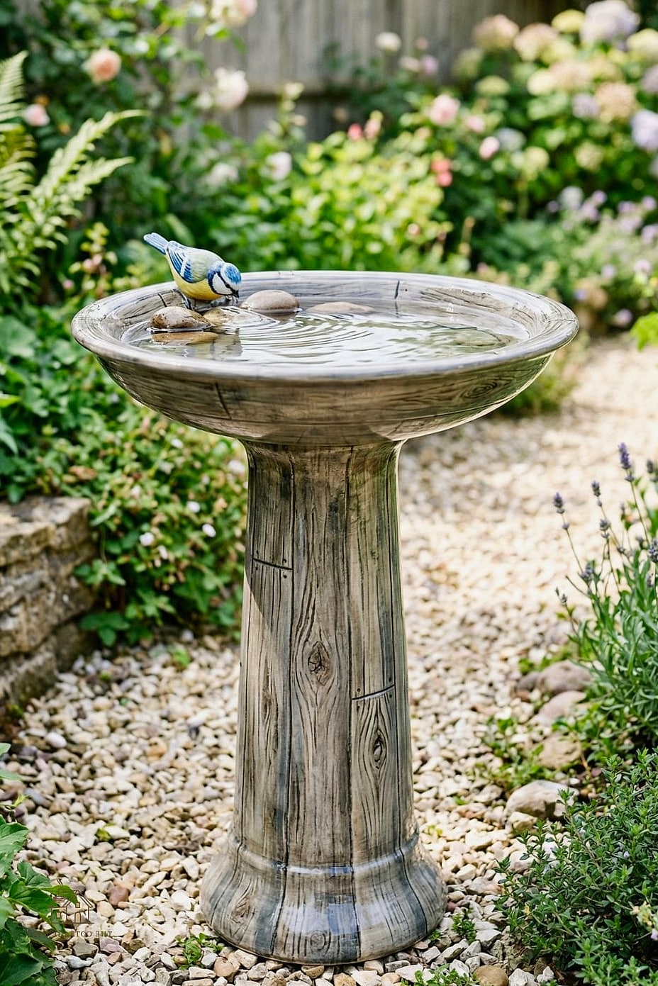 20 Clever Unique Bird Houses for Every Style 15 Stone and Wood Alpine Chalet