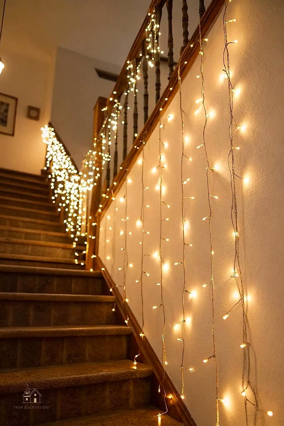 50 Clever Stairs Wall Decor Ideas for Every Style 29 String Light and Photo Clip Display
