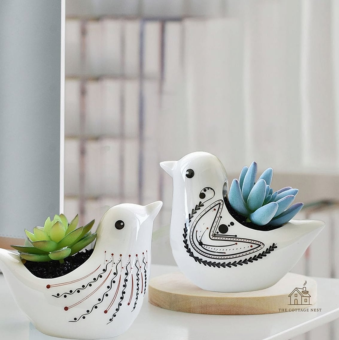20 Clever Unique Bird Houses for Every Style 17 Succulent-Topped Living Roof House