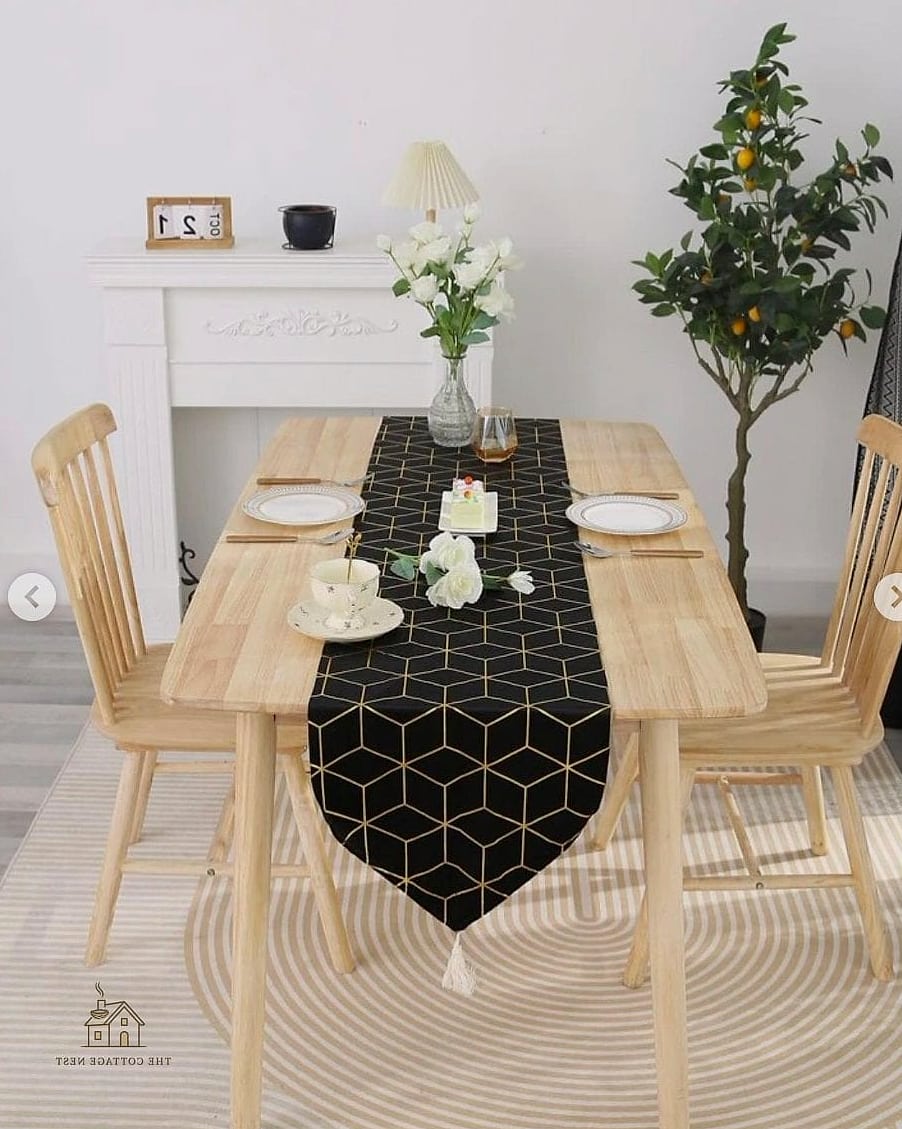 40 Beautiful Dining Room Table Decor Ideas to Transform Your Space 35 A Table Runner in a Bold Color