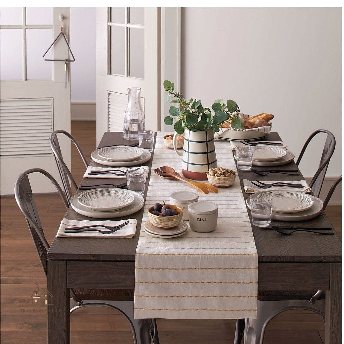 40 Beautiful Dining Room Table Decor Ideas to Transform Your Space 31 A Table Styled with Everyday Dishware