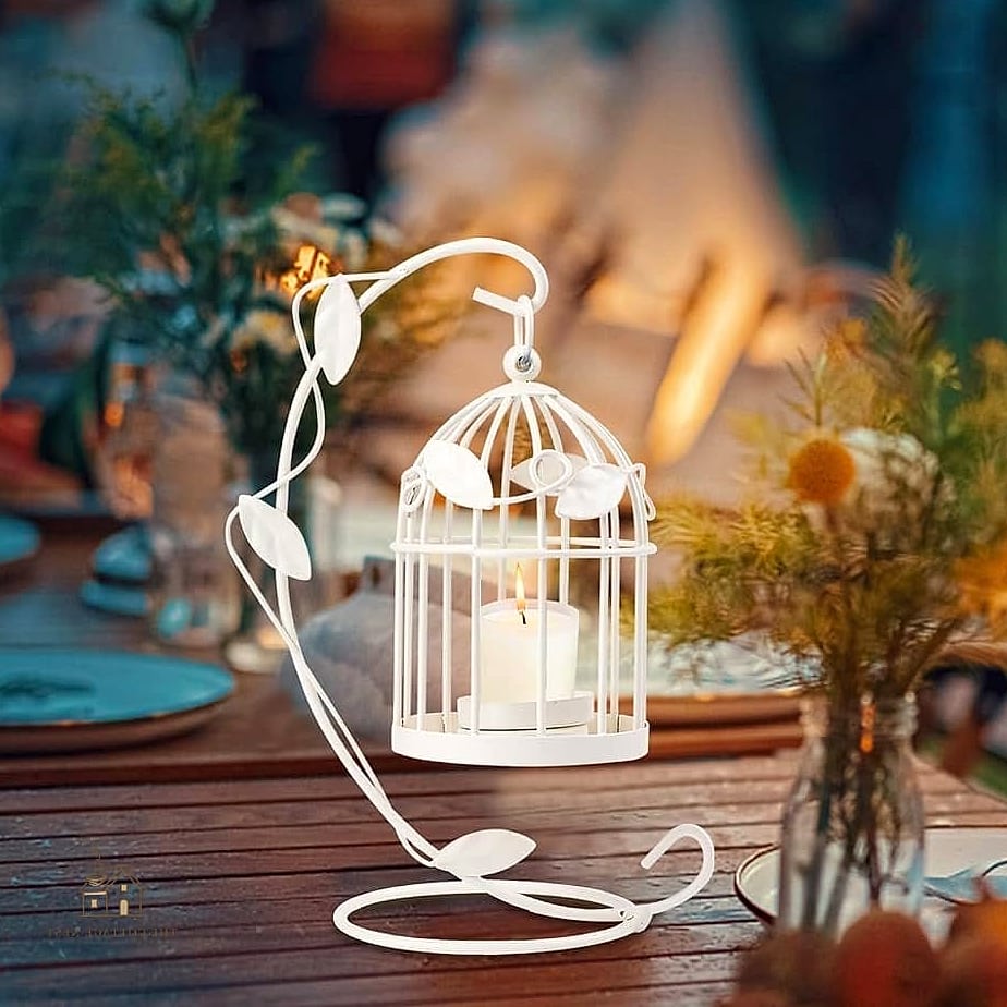 20 Clever Vintage Bird Cage Decor Ideas for Every Style 3 Use It as a Candle Lantern