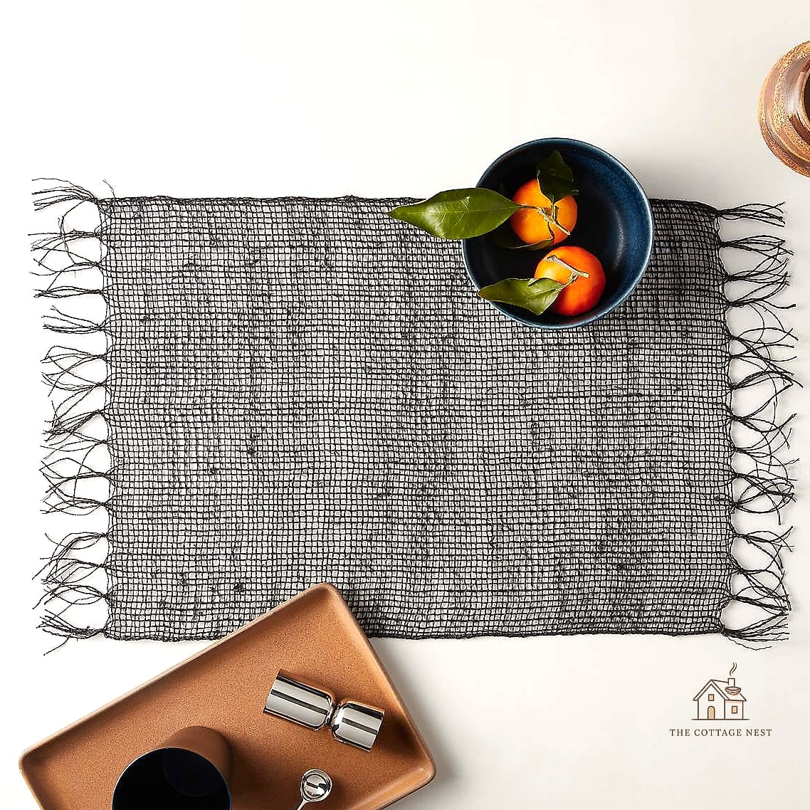 15 Stunning Black Dining Table Decor Ideas You'll Absolutely Love 7 Use Woven Placemats for Texture
