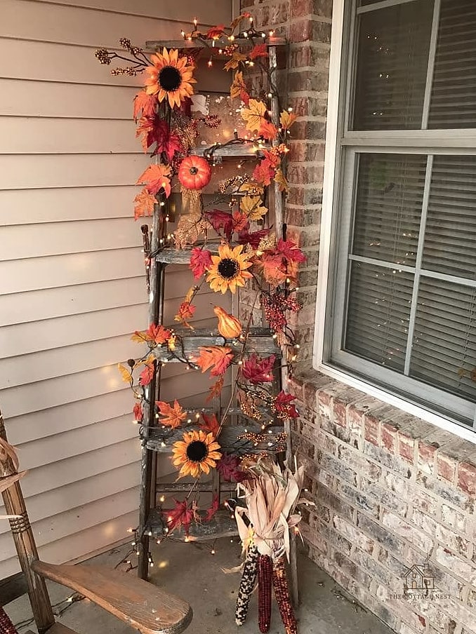 45 Gorgeous Fall Front Porch Decor Ideas That Are Totally Doable 9 A Vintage Ladder Display