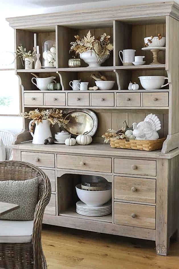 30 Dreamy Fall Hutch Decor Ideas to Try This Season 25 Vintage Milk Glass with Fall Blooms