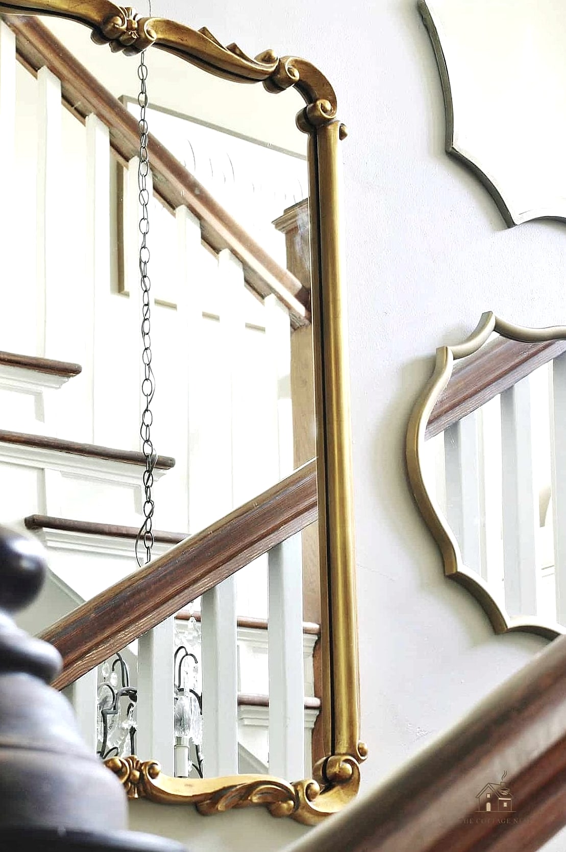 35 Creative Stair Landing Decor Ideas That Will Inspire You 9 Vintage Mirror as a Focal Point