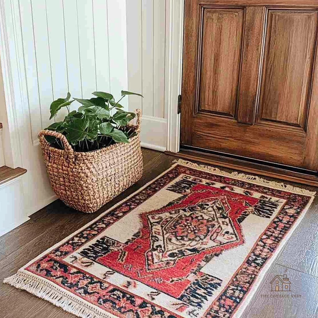 45 Stunning Small Entryway Ideas You'll Absolutely Love 29 A Vintage Rug for Character