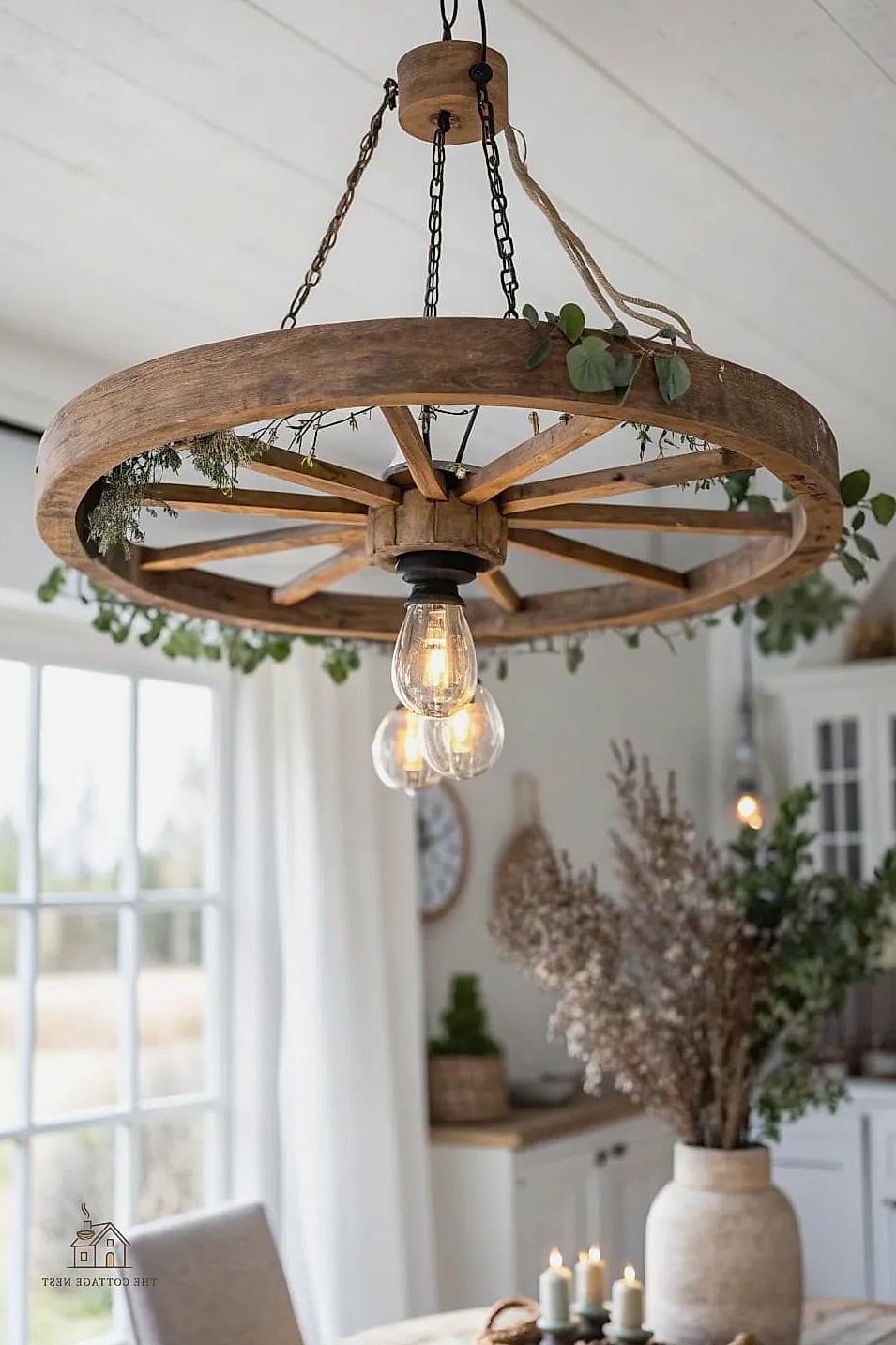 35 Gorgeous Farmhouse Dining Room Decor Ideas That Are Totally Doable 5 Wagon Wheel Chandelier