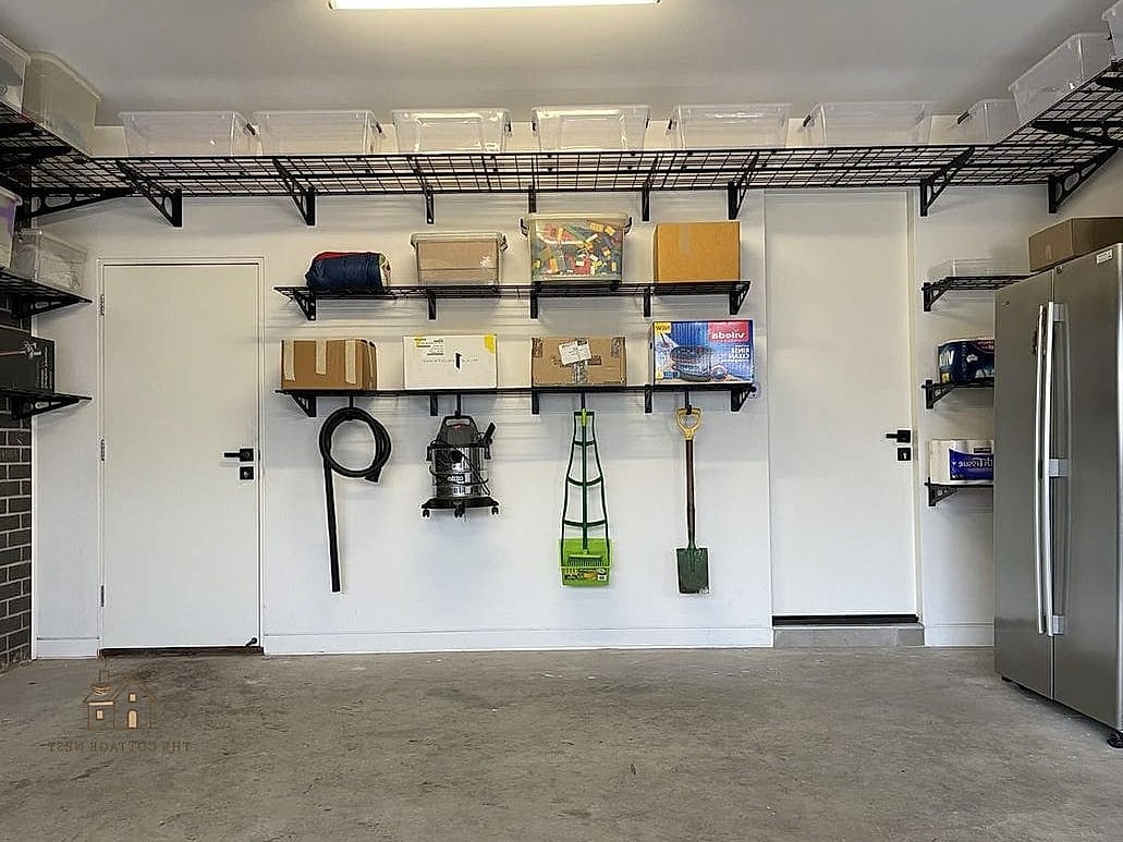 30 Amazing Budget Friendly Garage Organization And Storage Ideas on a Budget 17 Wall-Mounted Ladder Hooks