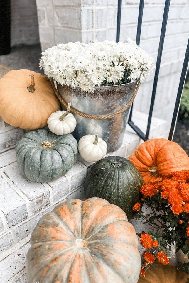 40 Clever Fall Front Porch Decor Ideas for Every Style 10 White Pumpkins on a Tiered Stand