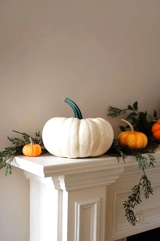 50 Amazing Fall Mantle Decor on a Budget 11 White Pumpkins for a Modern Twist