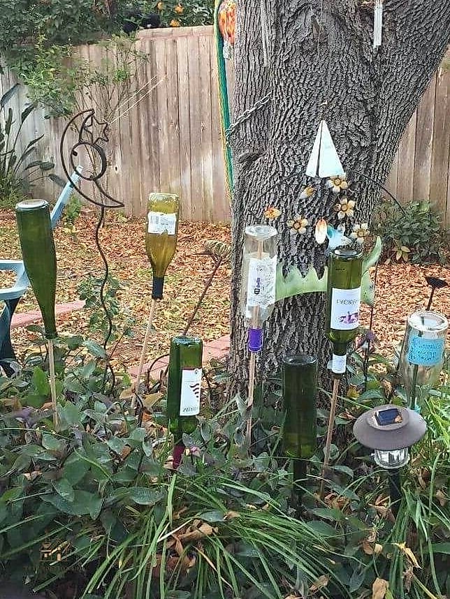 50 Clever Junk Garden Ideas Repurposed for Every Style 7 Wine Bottle Border Edging