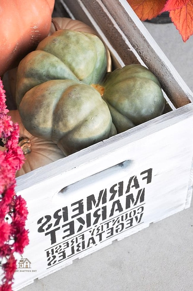30 Dreamy Farmhouse Fall Decor Ideas to Try This Season 3 Wooden Crate Pumpkin Displays