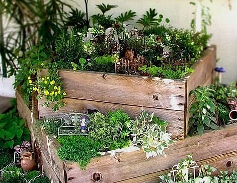 50 Clever Junk Garden Ideas Repurposed for Every Style 26 Wooden Crate Herb Shelf