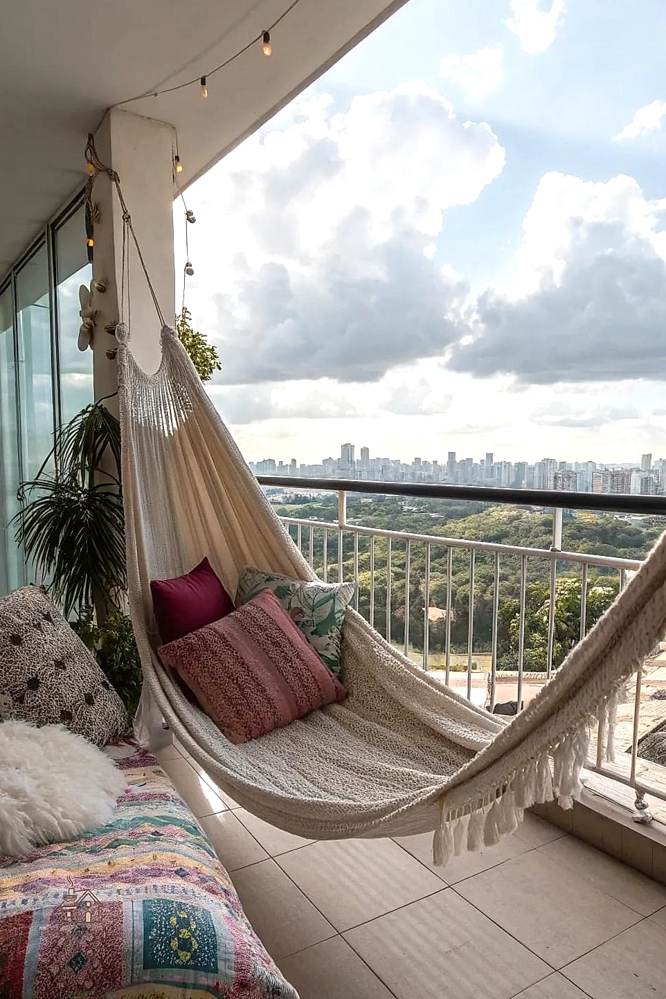 30 Cozy Fall Balcony Decor Apartment Worth Pinning 18 A Woven Hammock Chair for Extra Seating