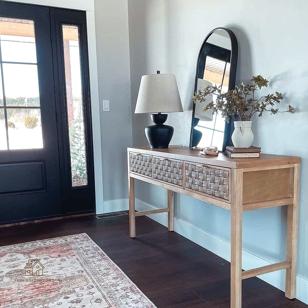 25 Chic Entryway Table Decor Ideas for a Beautiful Home 18 A Woven Wall Hanging as a Backdrop