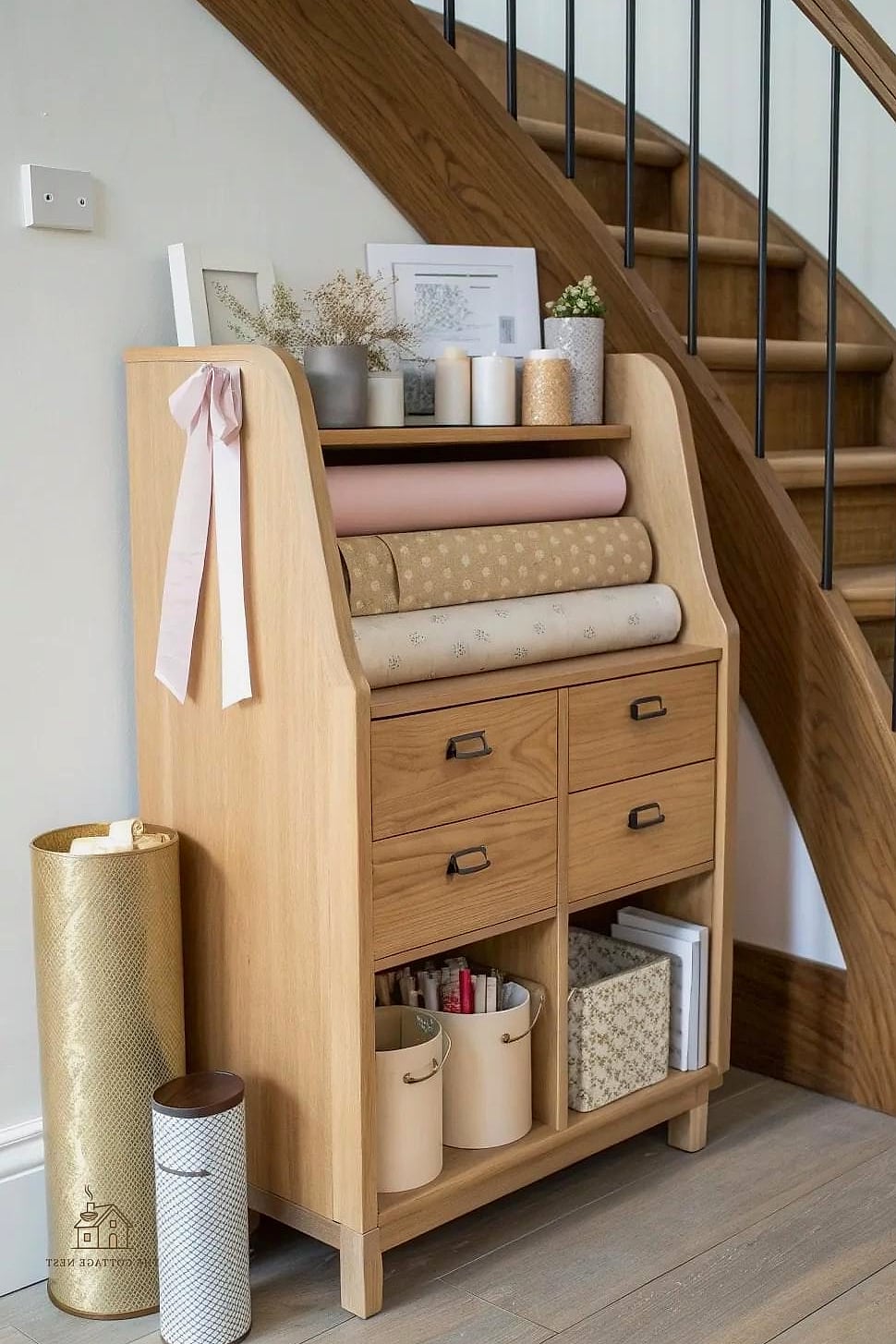 25 Gorgeous Under Stairs Ideas That Are Totally Doable 13 A Wrapping Station or Craft Closet